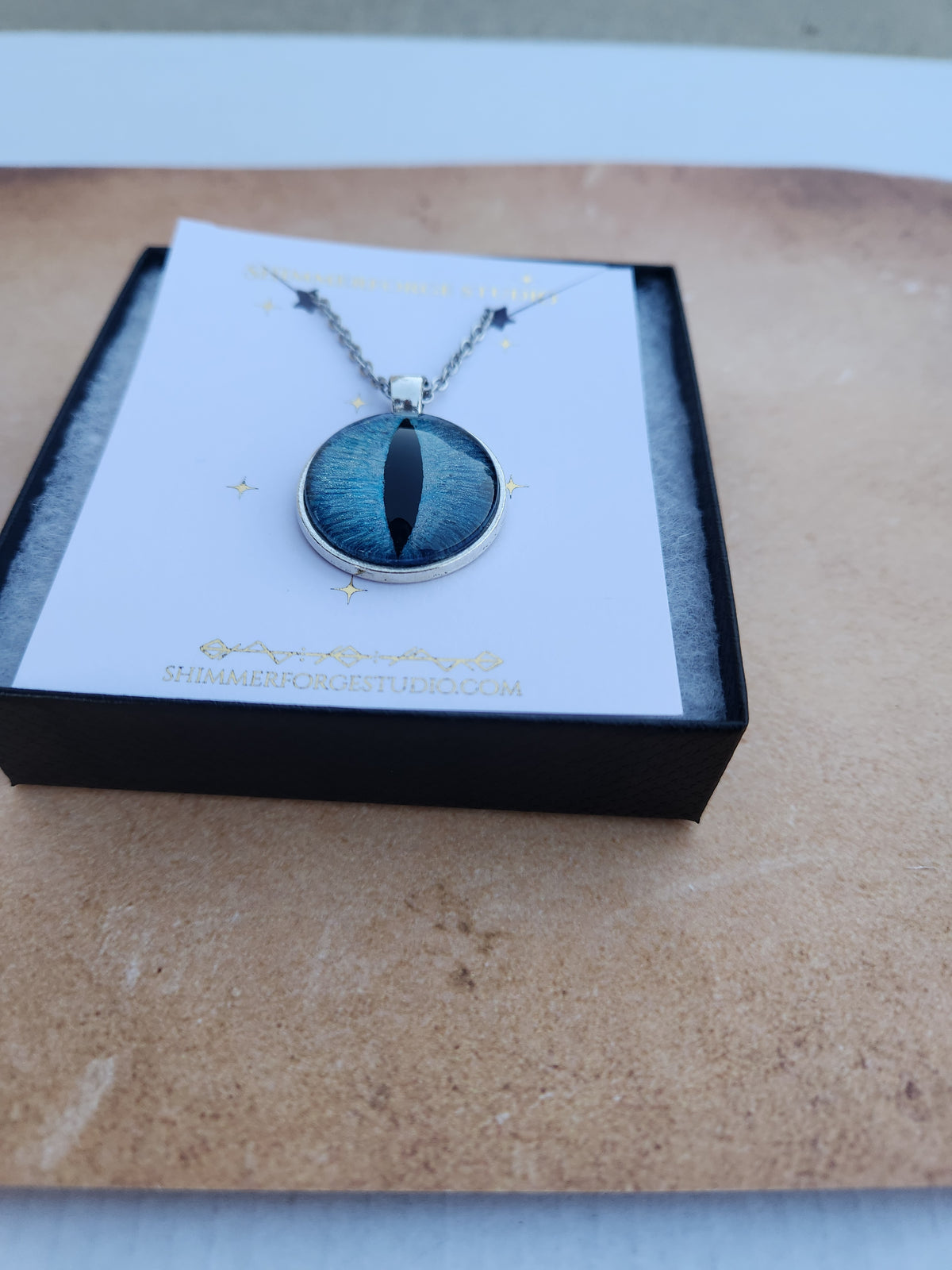 Ice Blue Dragon Eye Necklace Hand-Painted Fantasy Pendant Cyan Dragon Jewelry for Mythical Style & Gifts