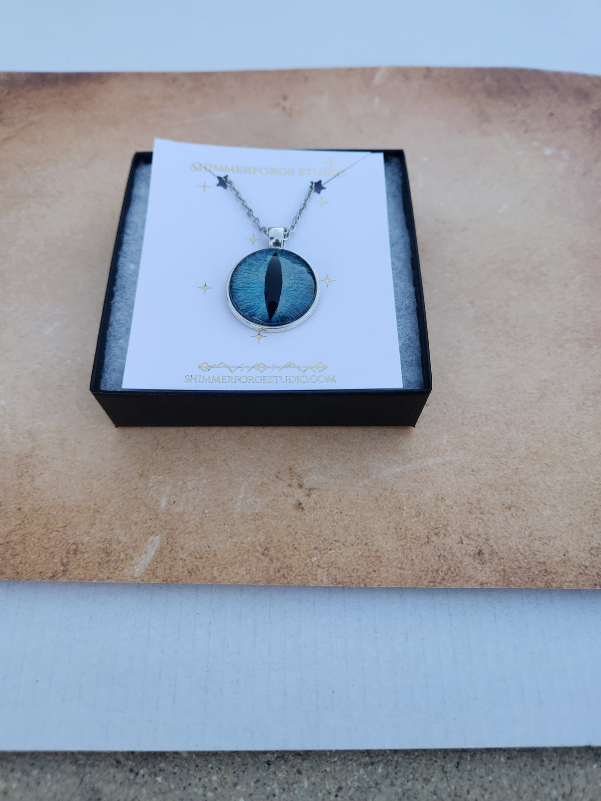 Ice Blue Dragon Eye Necklace Hand-Painted Fantasy Pendant Cyan Dragon Jewelry for Mythical Style & Gifts